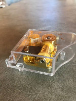 Acrylic tiny musical piano plays Memory