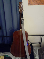 Mitchell D120S12E 12-String Acoustic-Electric Guitar bundle.