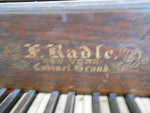 F. Radle New York Cabinet Grand Piano.