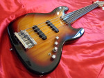 2012 Squier Deluxe Active V Sunburst Jazz Bass Guitar.