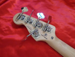 2012 Squier Deluxe Active V Sunburst Jazz Bass Guitar.