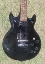 Ibanez Electric Guitar, Dual Cutaway, Pickups, Black.