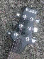 Ibanez Electric Guitar, Dual Cutaway, Pickups, Black.