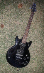 Ibanez Electric Guitar, Dual Cutaway, Pickups, Black.