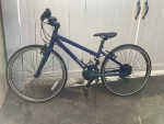 Child's Co-Op Berry Blue 24-inch frame bicycle