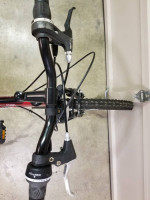 Mongoose Standoff boy mountain bike, full suspension, red 24-inch