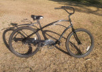 Men's Electra Cruiser 26-inch wheels and green lights in rims