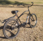 Men's Electra Cruiser 26-inch wheels and green lights in rims