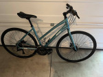 Medium Woman’s Breezer Discovery Hybrid Bike