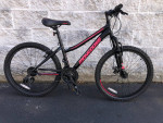24" Mongoose 21-speed hardtail mountain bike for ages 7 to 11