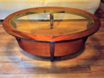 Oval coffee table with beveled glass top