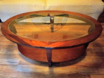Oval coffee table with beveled glass top