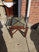 Glass top side table with slate tile under glass