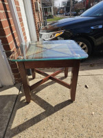 Glass top side table with slate tile under glass
