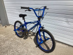 GOOD USED BLUE 20” GENESIS KROME 2.0 BMX/STUNT BIKE W/PEGS