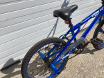 GOOD USED BLUE 20” GENESIS KROME 2.0 BMX/STUNT BIKE W/PEGS
