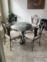 Round glass top table with 4 chairs