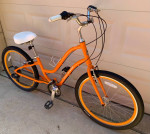 Nice orange comfort /cruiser bike , only ridden 4-5 time 26” wheels .
