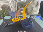 Bike Child Seat Hooks Up Between The handlebar Post And Seat Post.