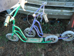 2 vintage scooters with mag wheels