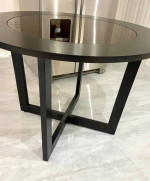round wooden table with glass