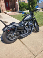 Up for sale 2013 Harley Davidson Iron 883 with only 1370 miles on it