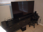 Table chair cabinet 55-in TV