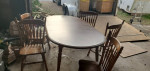 TABLE SET WITH 2 LEAVES & 5 STURDY CHAIRS