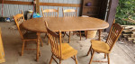 TABLE SET WITH 2 LEAVES & 5 STURDY CHAIRS
