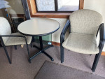 Very small gray table and 4 stackable chairs