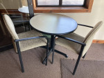 Very small gray table and 4 stackable chairs