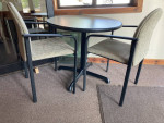 Very small gray table and 4 stackable chairs