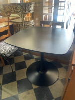 Black pedestal table
