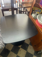 Black pedestal table