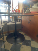 Black pedestal table