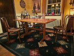 Woodgrain Dining Table with Lighted China and Chairs