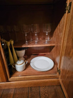 Woodgrain Dining Table with Lighted China and Chairs