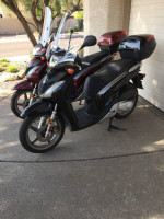 two Honda SH150i touring Scooters