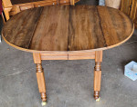 Oval drop leaf table on wheels