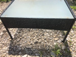 Wicker and glass table