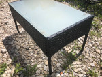 Wicker and glass table