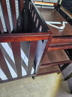Crib with changing table