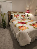 Bedroom set - headboard, mattress, bedding, lamp, end table, plant