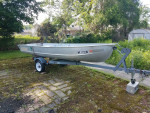 14 ft Aluminum boat, trailer, and trolling motor