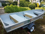 14 ft Aluminum boat, trailer, and trolling motor
