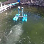 USED BEACH SWEEPER FOR LAKE WEEDS AND MUCK ON FLOATS