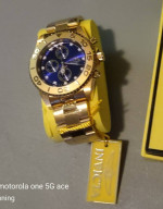 Invicta Gold Tone Blue face men's dive watch Never worn new in box