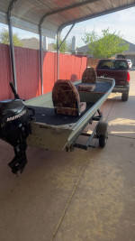 15.6 foot Jon boat with 9.9 mercury