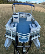 21FT Sun Tracker & New 2024 Pontoon Trailer