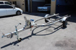 New Triton jet ski trailer, torsion axle, all aluminum, LED lights,